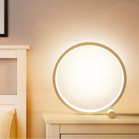 Circular touch-sensitive bedside lamp